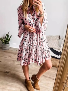 Women's pink leopard print long sleeve mini dress with buttoned collar and tiered skirt