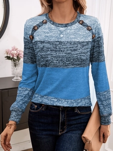 Women's color block long sleeve knit shirt with blue and grey panels and shoulder buttons