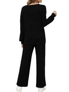 Back view of comfortable black knit two-piece lounge set with long sleeves and wide-leg pants