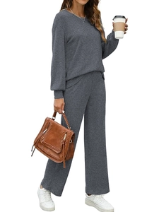 Detail view of dark grey ribbed knit loungewear set featuring long sleeve top and pants