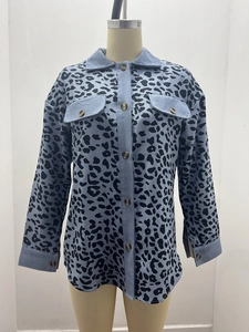 Detail of leopard print corduroy jacket with flap chest pockets and button closure