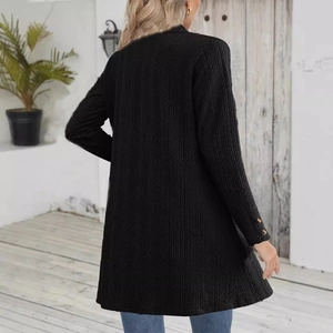 Women's long sleeve black cardigan coat with textured fabric and gold buttons on cuffs