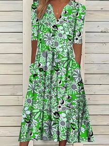 Elegant green floral print V-neck midi dress with mid-length sleeves and side pockets