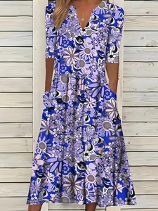 Elegant floral V-neck midi dress with half sleeves and side pockets for summer