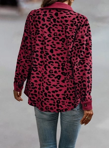 Rear view of a loose-fit corduroy jacket featuring pink leopard print with back detail