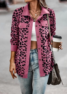 Detail of pink leopard print corduroy jacket featuring flap chest pockets and dark buttons