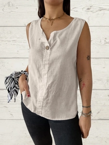 Relaxed V-neck sleeveless linen top in beige with button detail and casual fit