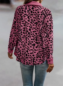 Detail view of pink corduroy jacket with leopard print and vertical ribbed texture on back