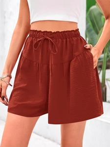 Short femme taille haute ample avec cordon de serrage et poches latérales rouge brique
