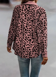 Detailed back view of a pink leopard print corduroy jacket with long sleeves and buttons