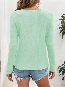Detail view of mint green waffle texture on this women long sleeve casual t-shirt