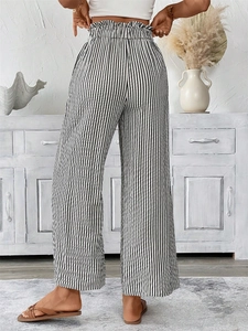 Rear view of striped high-waisted wide-leg trousers with elegant paperbag waist detail