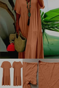 Detail of caramel V-neck tiered maxi dress with breathable fabric and pleated hemline