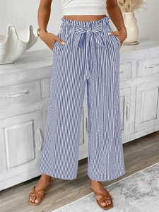 Women's blue and white striped high waist wide leg trousers with bow tie belt and pockets
