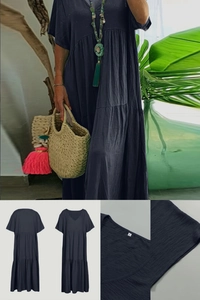 Detail of V-neckline and breathable cotton-linen fabric texture on navy summer dress