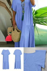 Detail of the V-neck tiered maxi dress with short sleeves in lightweight blue fabric
