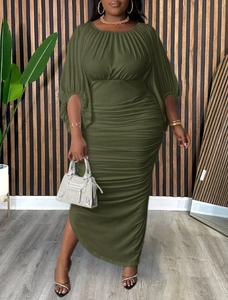 Detail showing elegant olive green maxi dress with ruched waist and raglan lantern sleeves