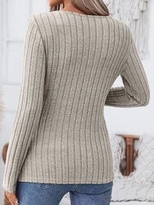 Detailed back view of a slim-fit ribbed knit long-sleeve top in light grey color