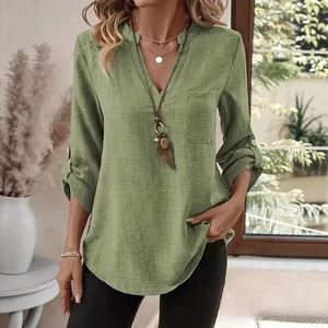 Women's green V-neck button shirt in textured linen fabric with a chest pocket