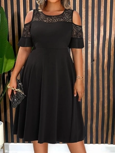 Detail of cold-shoulder design with delicate lace patchwork on black plus size dress