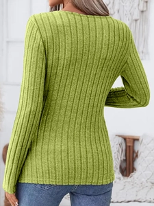 Close-up back view of mustard green ribbed knit sweater with vertical texture