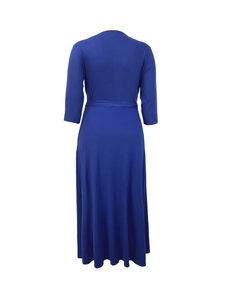 Detail view of the back of a royal blue crew neck A-line dress with high waist design