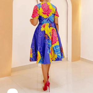 Short sleeve A-line floral dress with vibrant African wax print and back zipper closure