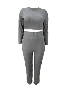Detail of grey knit long sleeve crop top and high waist leggings matching set
