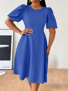 Detailed view of puff sleeves and round neckline on a royal blue A-line dress