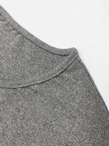 Detail of marl grey knit fabric showing premium double-needle stitching and texture