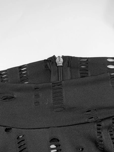 Détail macro de la fermeture éclair sur robe en maille avec tissu style punk