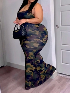 Detail shot of the camouflage print and bodycon fit on this plus size maxi dress