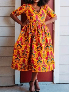 Ethnic print plus size A-line dress with V-neck and yellow geometric patterns