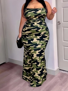 Detail of slim fit maxi dress featuring camouflage print and a mermaid hem silhouette