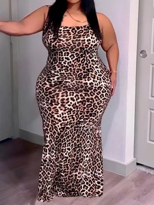 Detail shot of plus size leopard print cami maxi dress featuring slim fit and thin straps