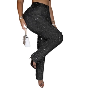 Women's black high-waisted skinny party pants with shimmering silver sequins all over