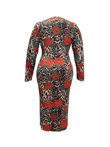 Rear view of a bodycon dress with bold leopard print and vibrant red rose patterns