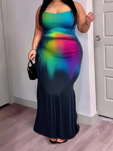 Detailed view of the colorful gradient print and slim fit on this plus size maxi dress