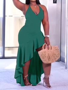 Detail of dark green halter neck dress with V-neck cross design and ruffled hemline