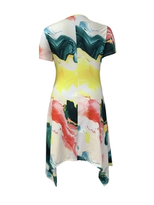 Detail of elegant short sleeve dress featuring colorful marble print and irregular hemline