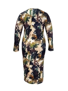 Rear view detail of a long-sleeved midi dress featuring an abstract forest floral print
