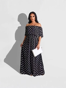 Elegant black off-shoulder polka dot pleated maxi dress with a stylish layered chest design
