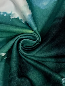 Macro view showing the soft microfiber fabric texture with green marble print detail
