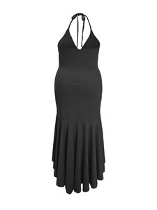 Detail of elegant black halter backless maxi dress with a tie-neck and fishnet ruffle hem