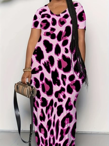 Close-up of pink and black leopard print pattern and V-neckline on a summer maxi dress