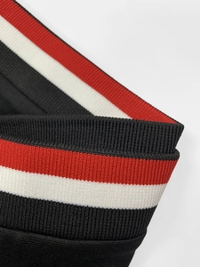 Women's V-neck dress featuring striped ribbed knit cuffs in red, white and black colors