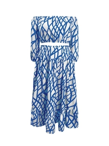 Detail of off-shoulder crop top and tiered skirt with blue abstract geometric patterns