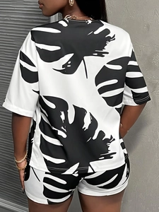 Women's two-piece summer set with tropical black and white leaf print shorts and t-shirt