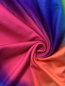 Macro detail of colorful tie-dye printed fabric with elastic texture and gradient pattern