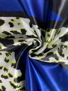 Women's lounge set with shiny satin fabric and blue leopard print patchwork design